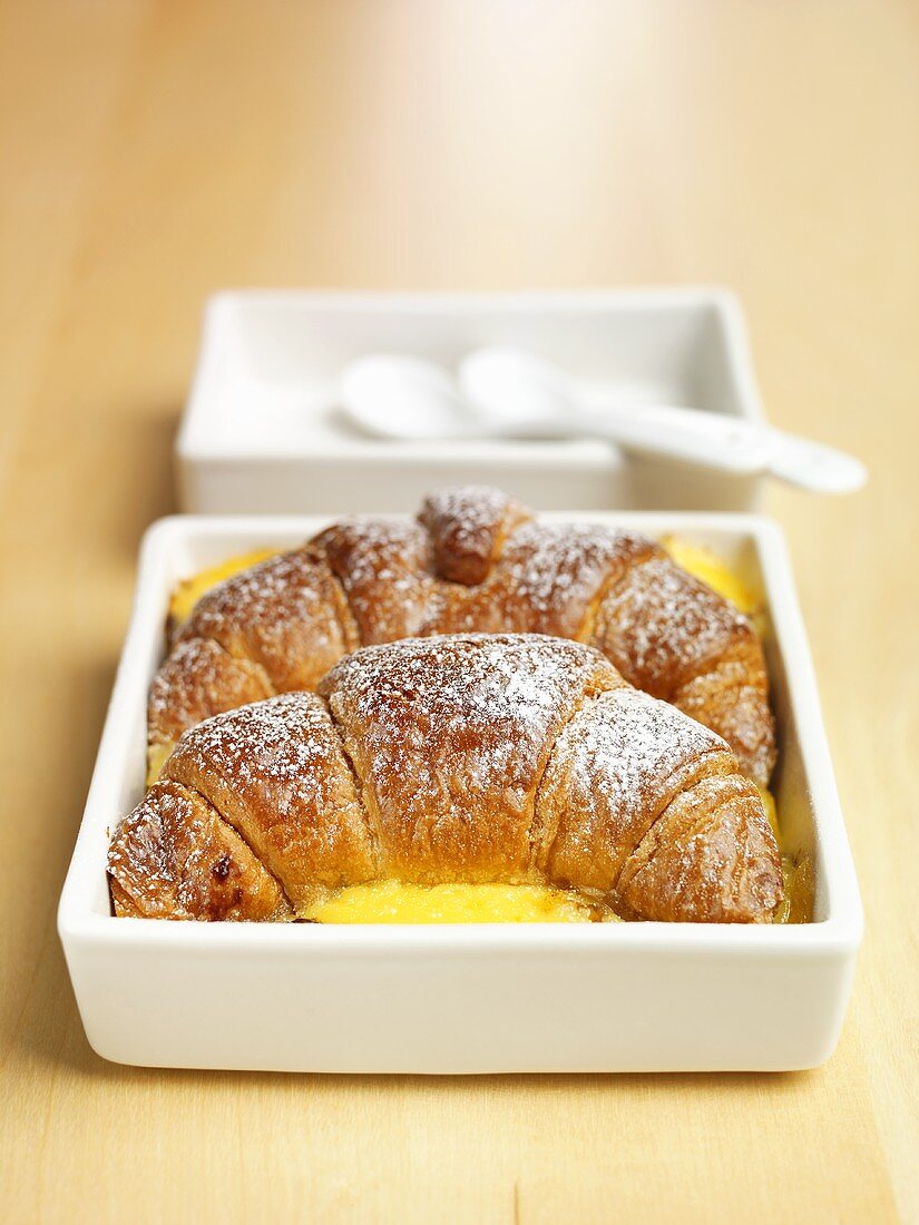 Chocolate croissants in custard