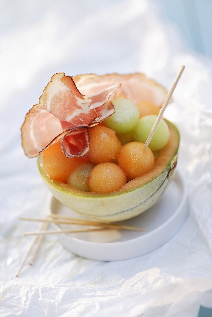 Charentais melon balls with raw ham