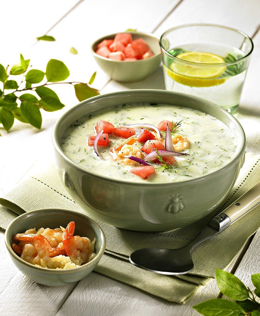 Cream of cucumber soup with prawns and watermelon