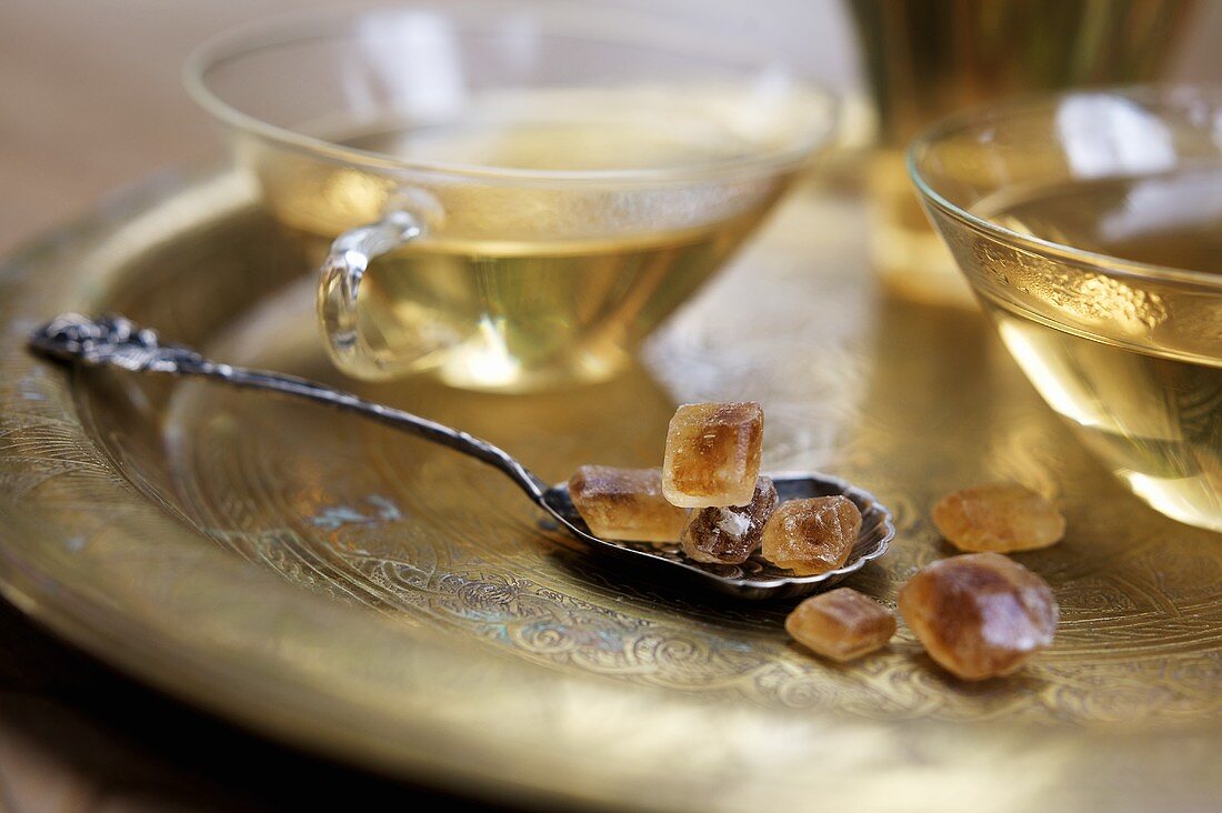 Tea and brown sugar crystals