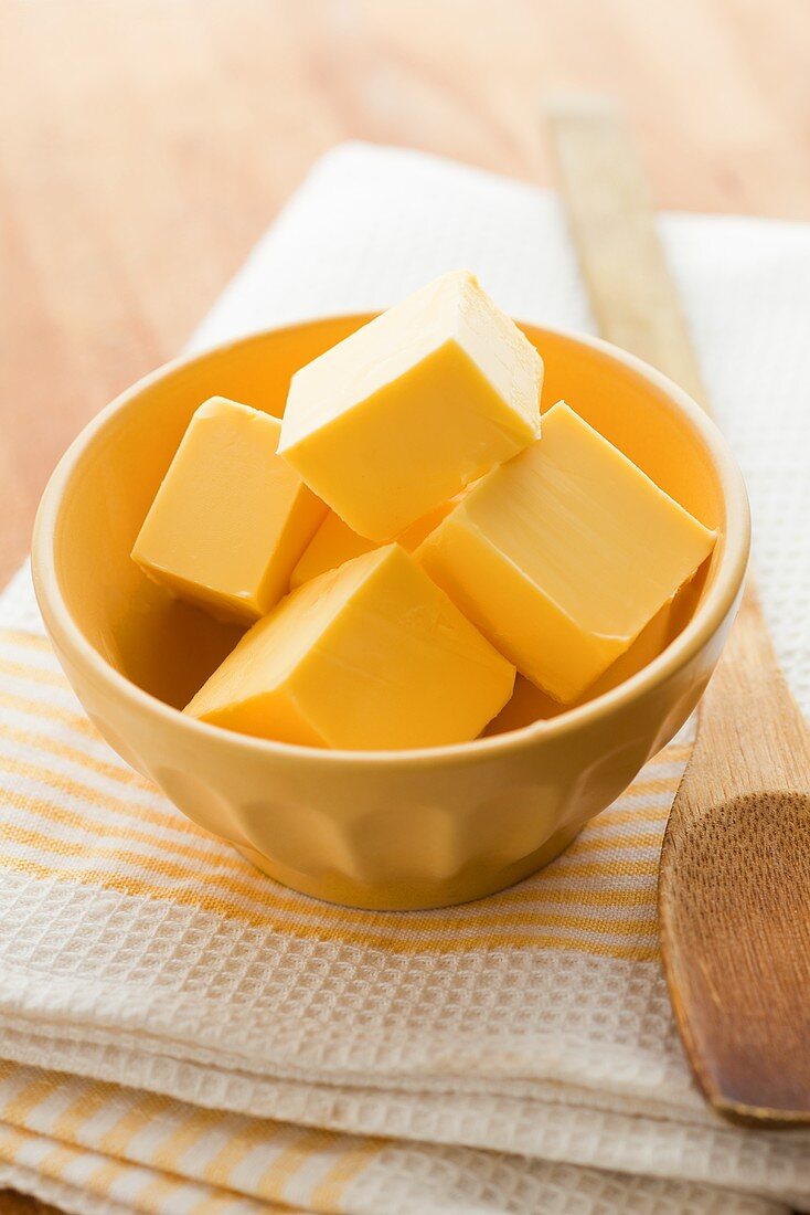 Butter cubes in ceramic bowl