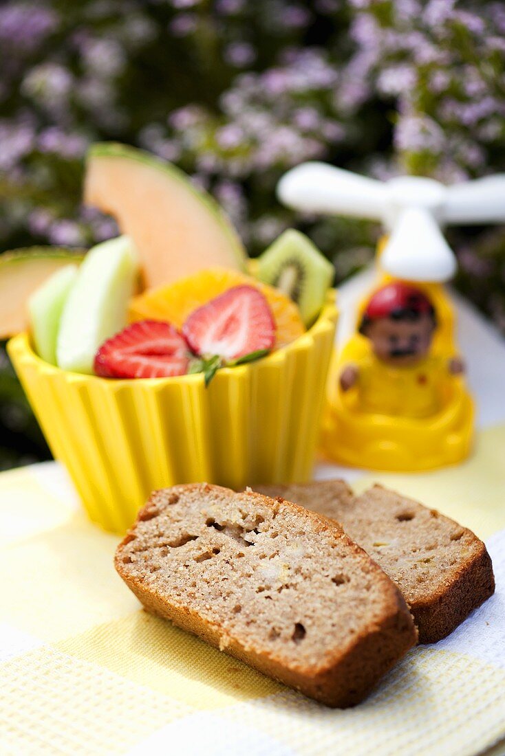 Banana bread and fruit for children