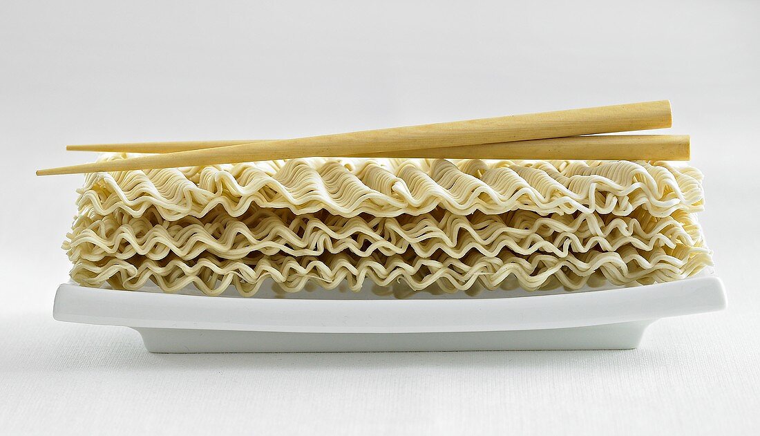 Chinese egg noodles with chopsticks