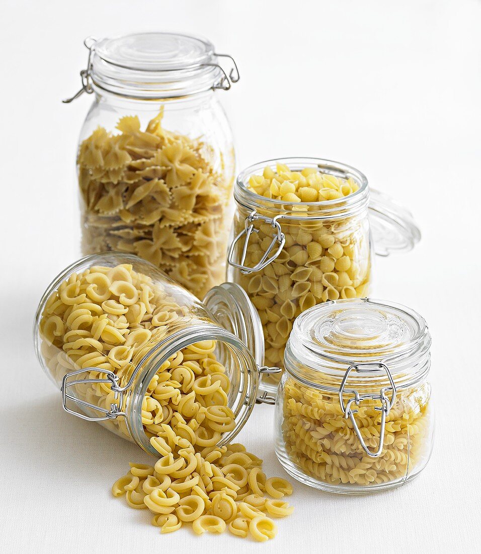 Various types of pasta in storage jars
