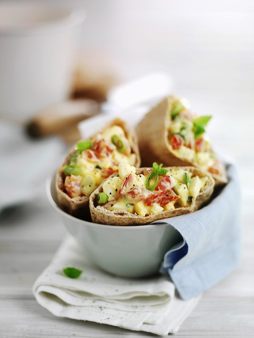 Wraps filled with egg and tomato salad