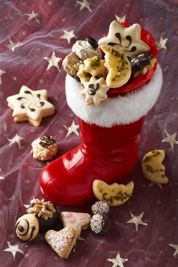 Santa's boot with assorted Christmas biscuits