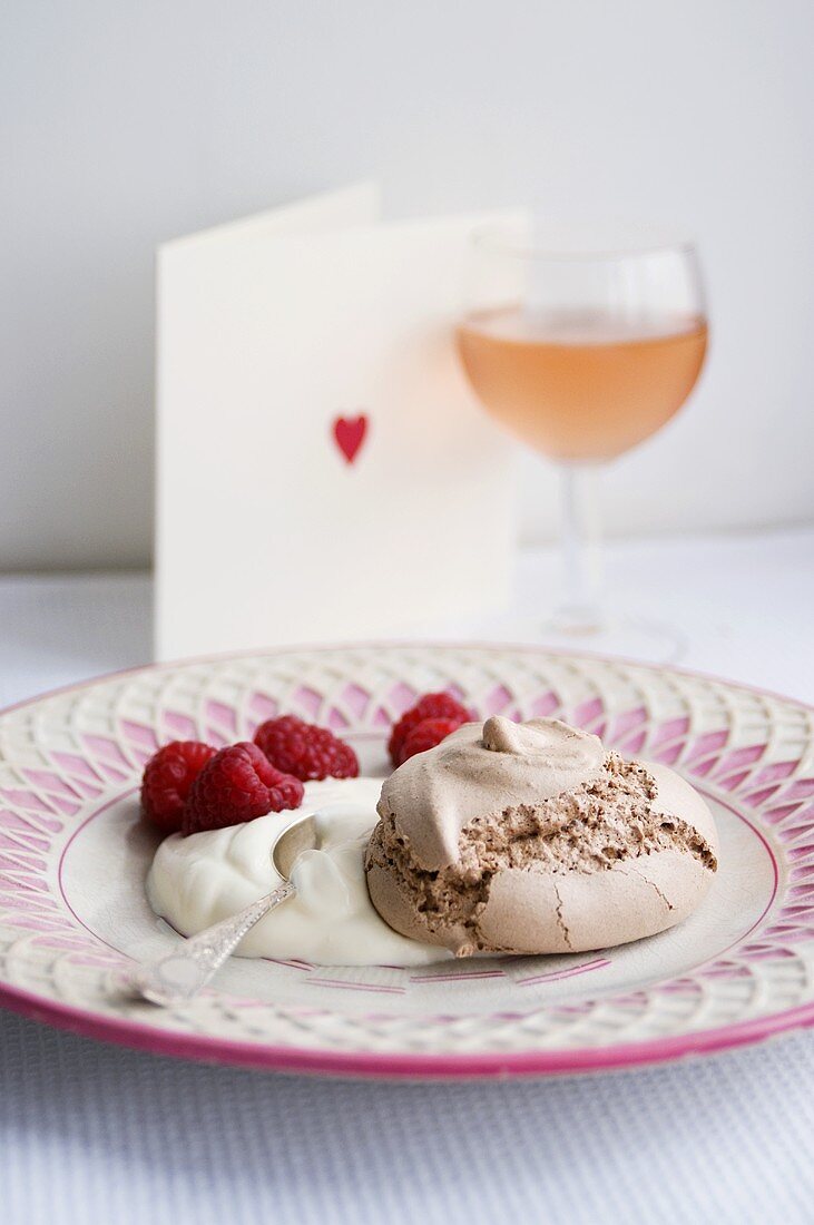 Meringue with raspberries and cream for Valentine's Day
