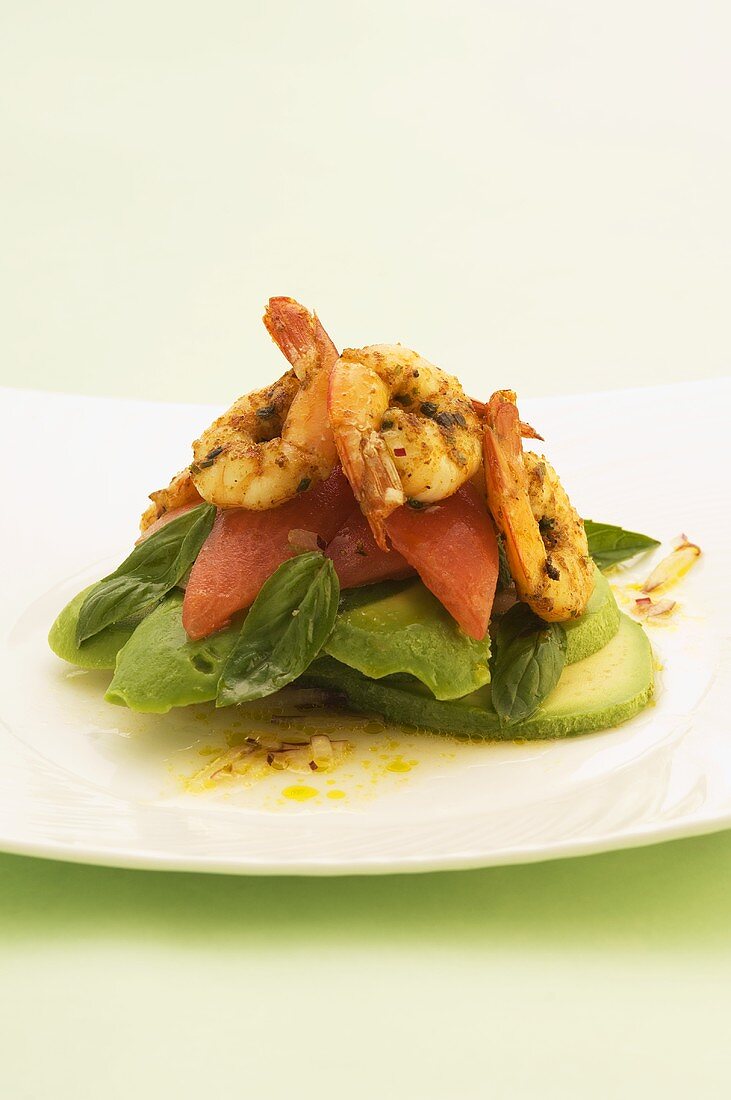 Spicy prawns on tomato and avocado