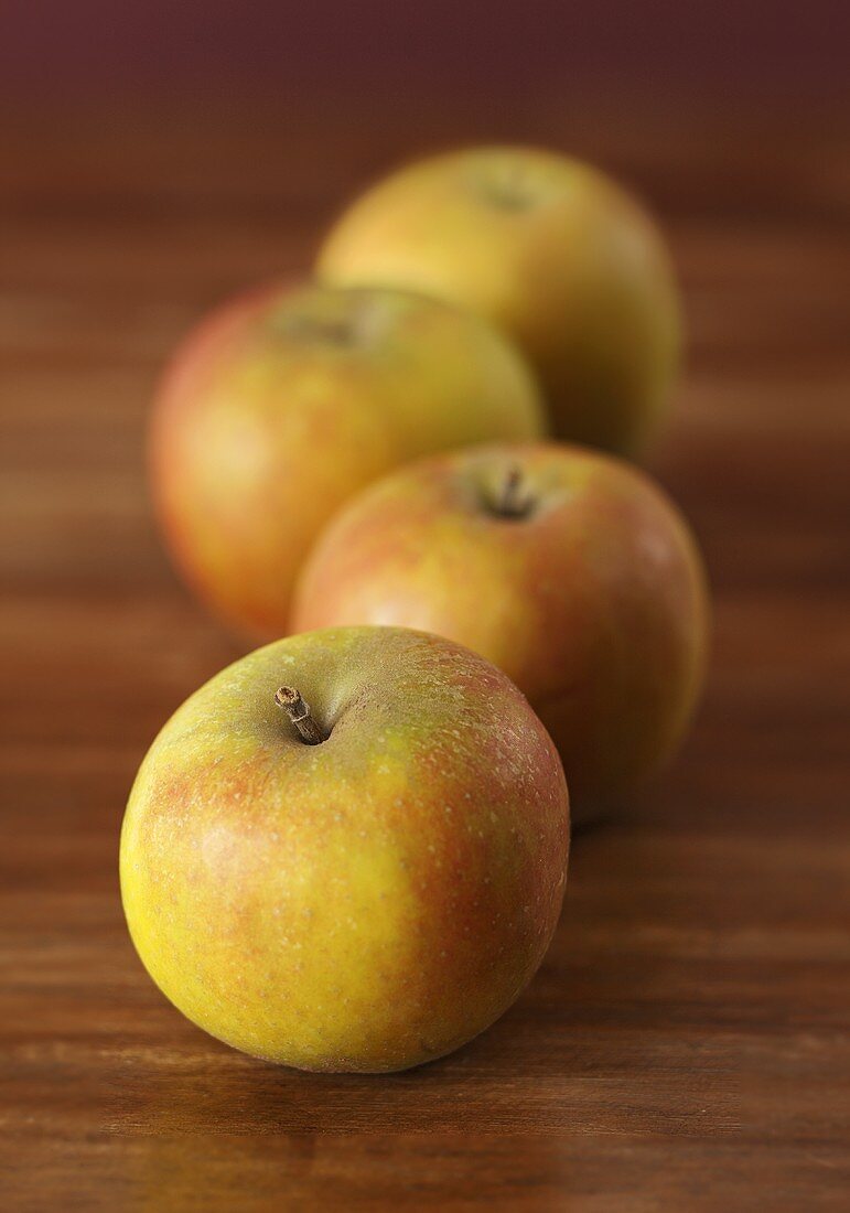 Four apples (Cox's Orange Pippin)