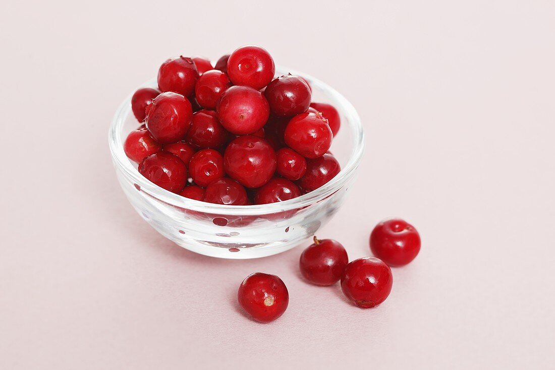 Cowberries in a small glass dish