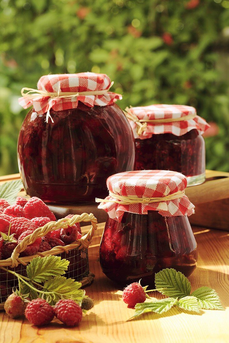 Three jars of raspberry jam