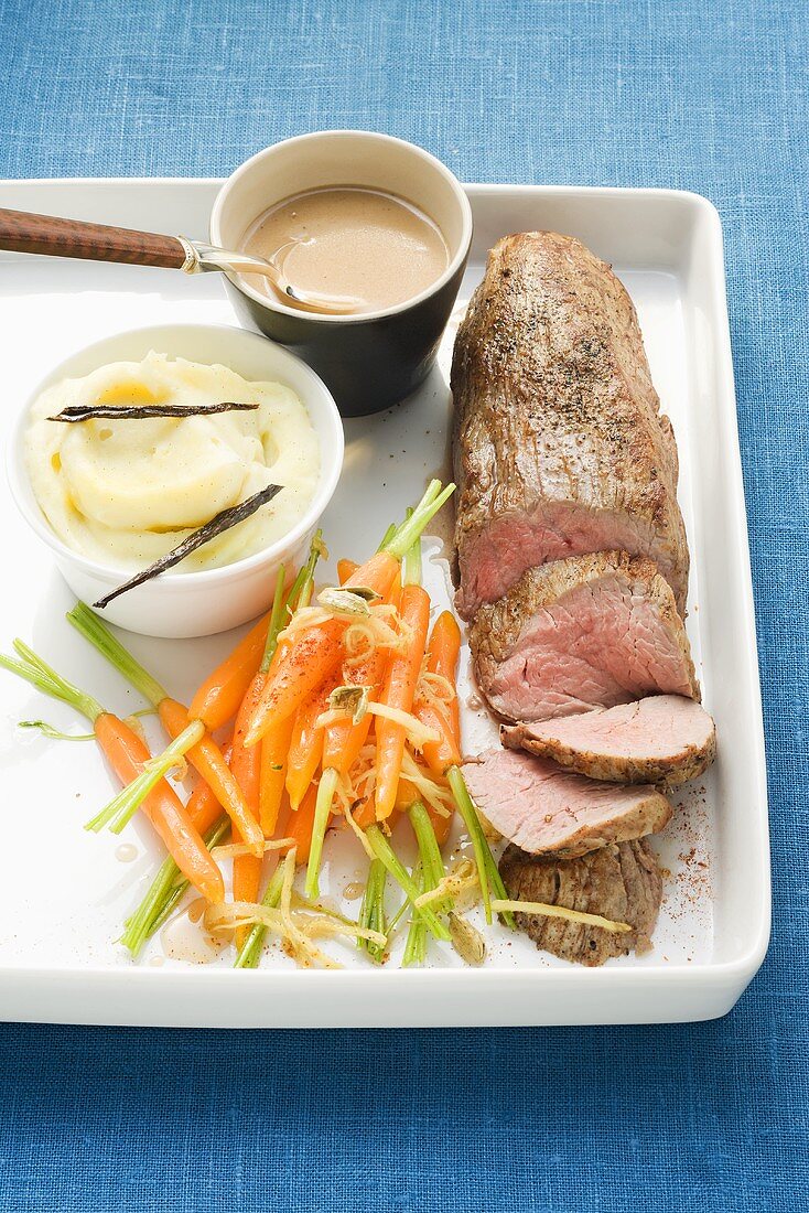 Veal fillet with cognac sauce and cardamom carrots