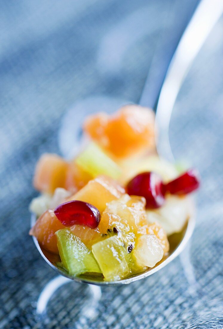 Fruit salad in ladle