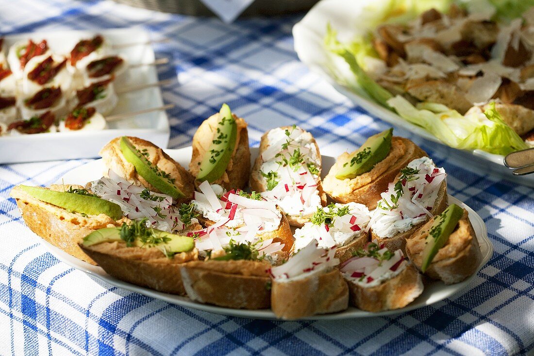 Salmon paste, avocado & cress, soft cheese, radishes & cress on baguette