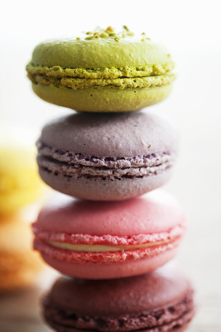 Different coloured macarons (small French cakes, stacked)