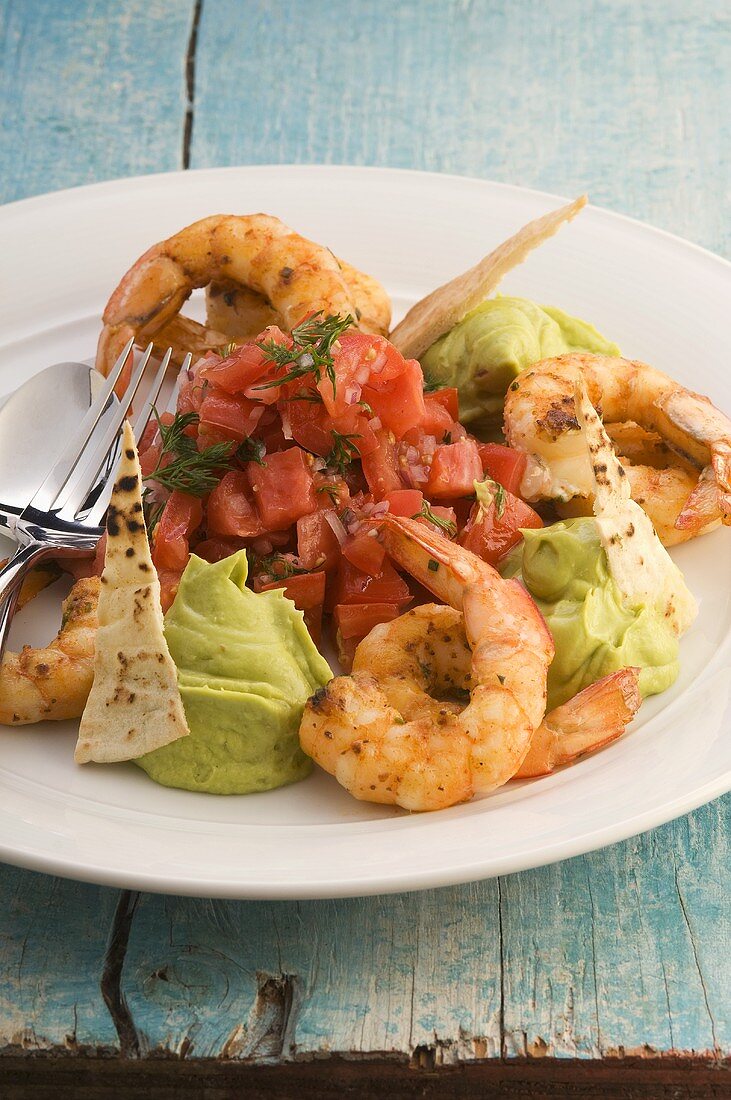 Prawns with avocado cream and tomato salsa