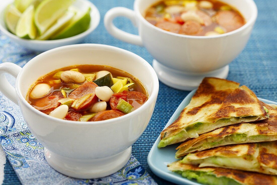 Bean soup with chorizo, avocado quesadillas