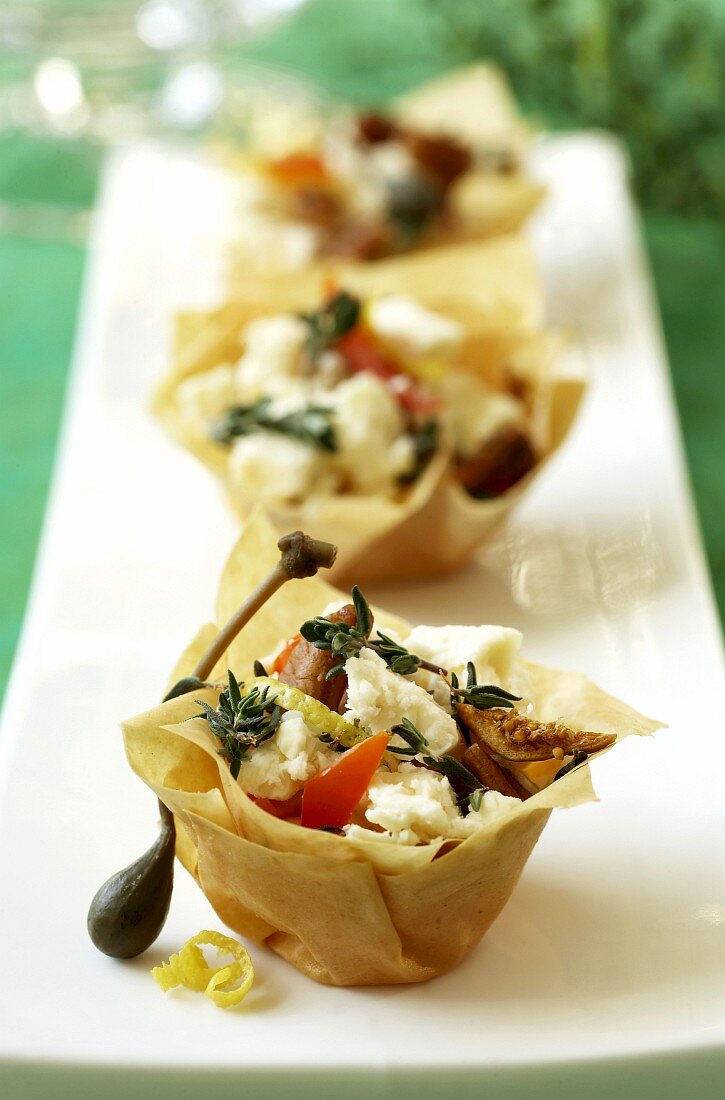 Filo pastry shells with feta and fig filling