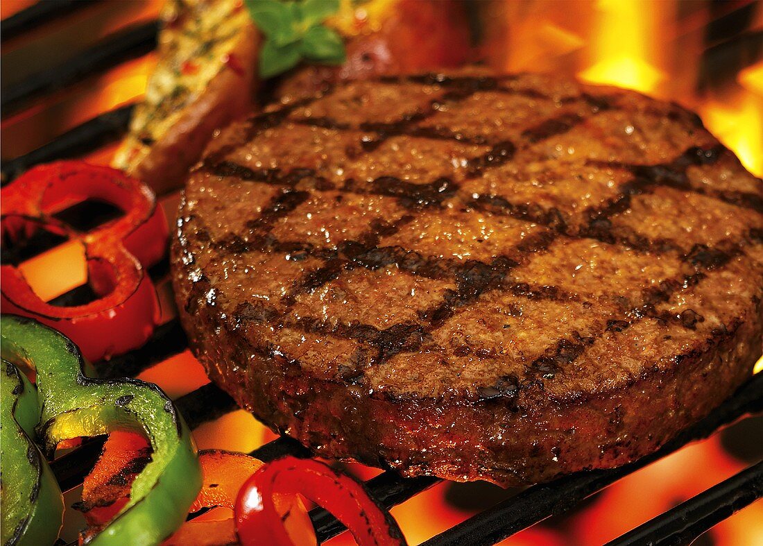 Burger on a barbecue (close-up)