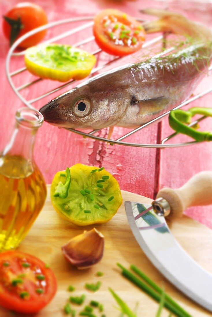 A whiting with tomatoes and herbs