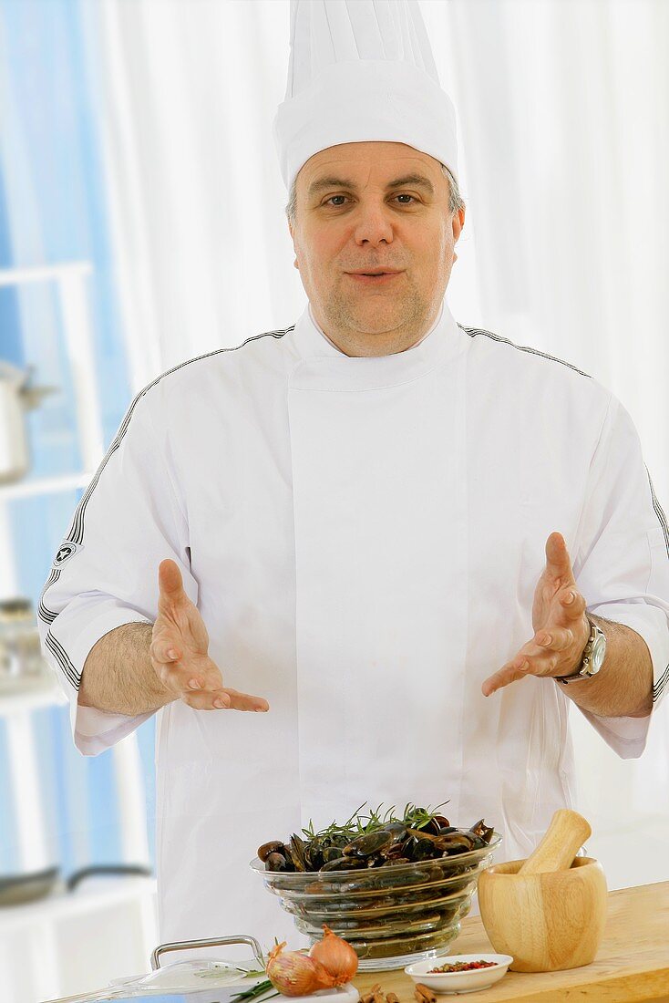 Chef with shellfish salad