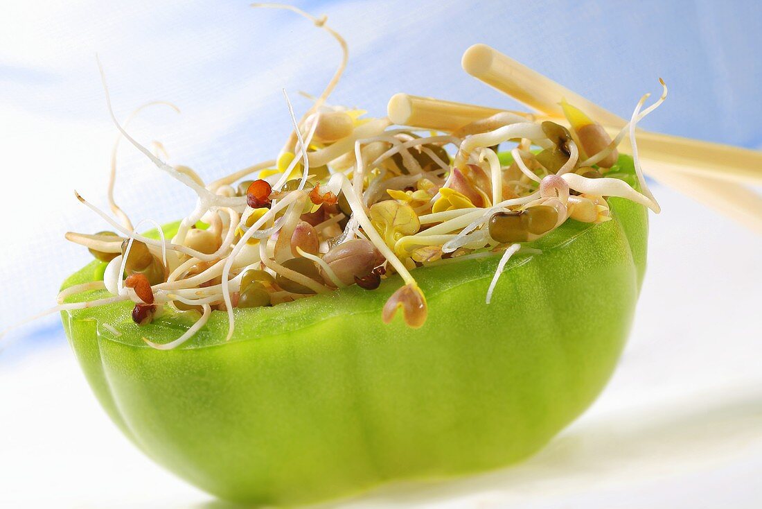 Green tomato stuffed with sprouts