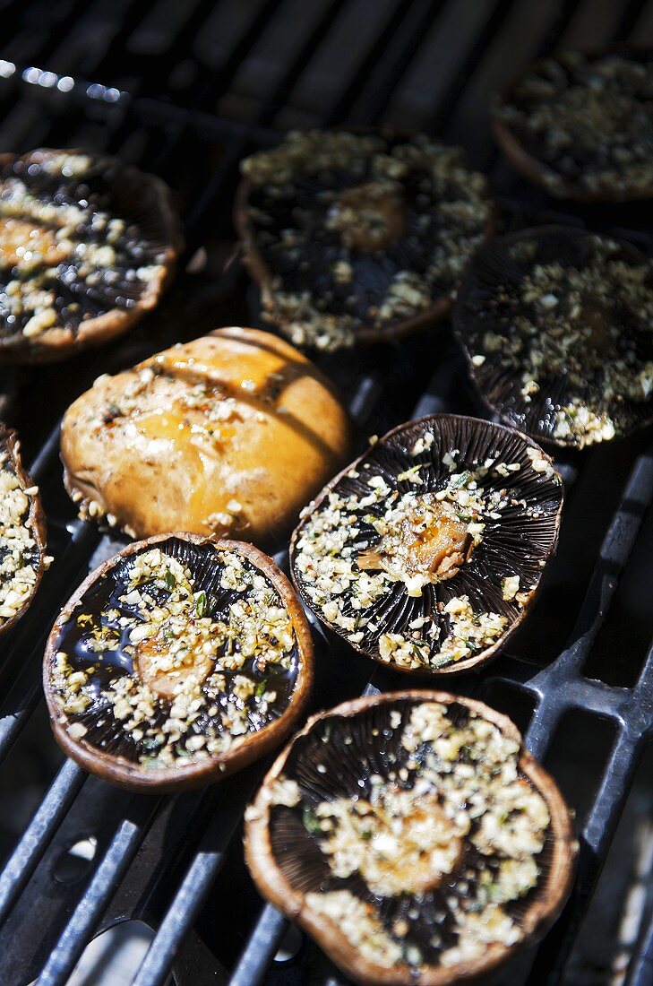 Portobello mushrooms on a barbecue