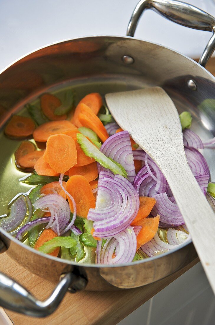 Sweating carrots, onions and celery