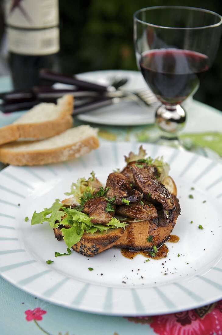 Fried chicken liver with balsamic vinegar on toast