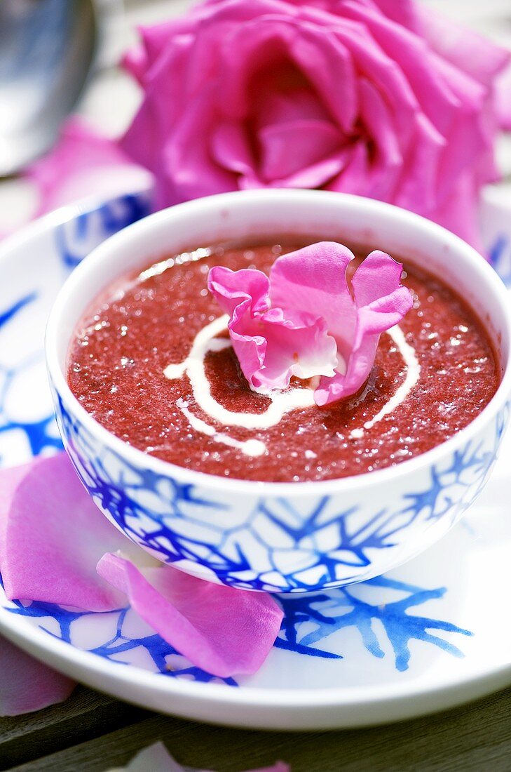 Cherry soup with rose petals