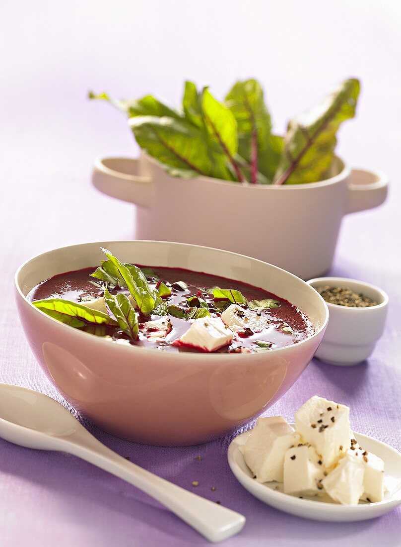 Beetroot soup with chard leaves and feta