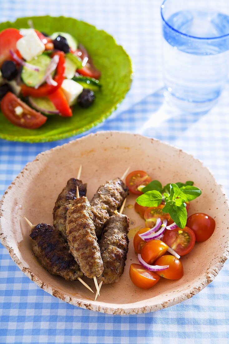 Lamb skewers and Greek salad