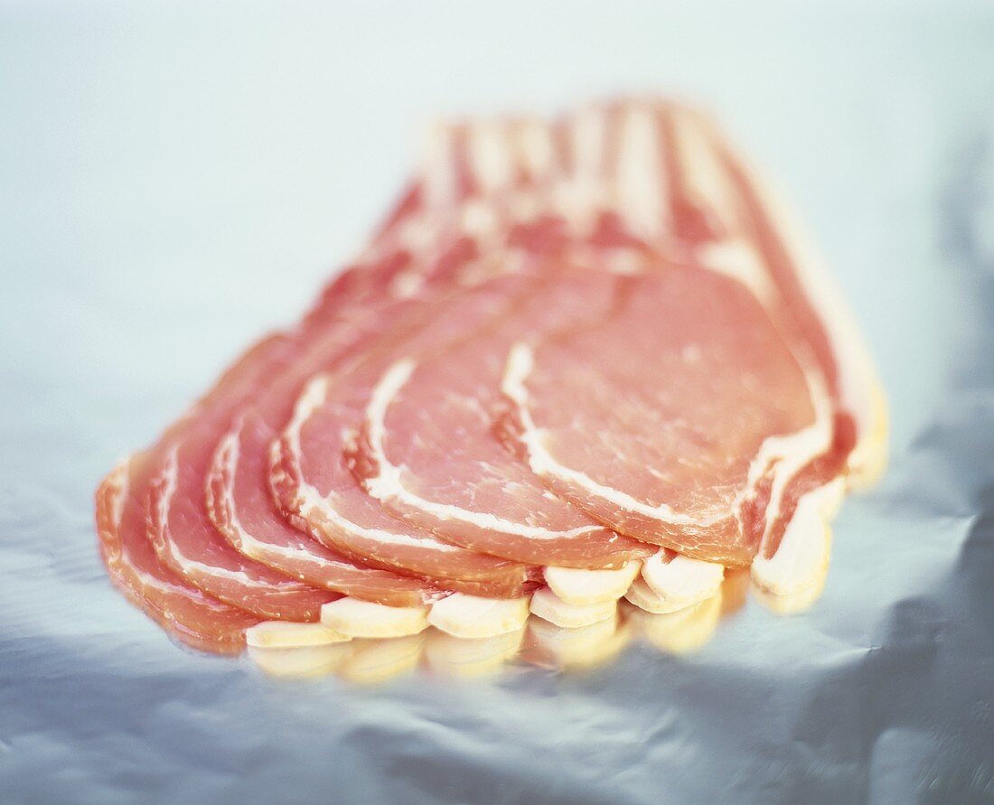 Slices of organically cured and smoked bacon