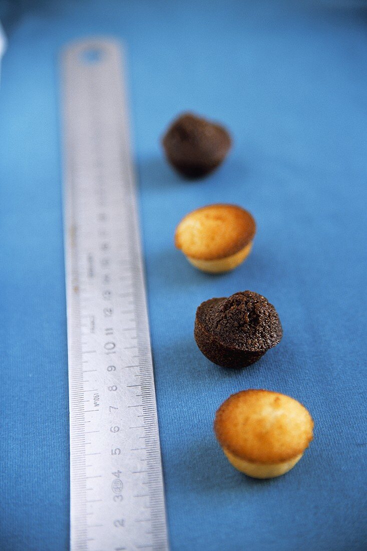 Mini financiers (small French cakes) and a ruler
