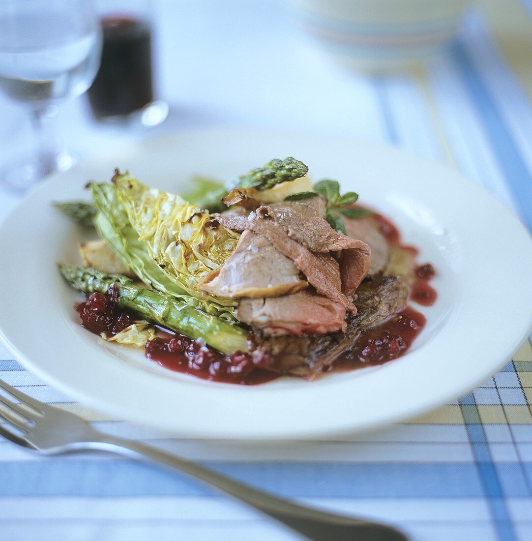 Lamb on cabbage and cranberry sauce