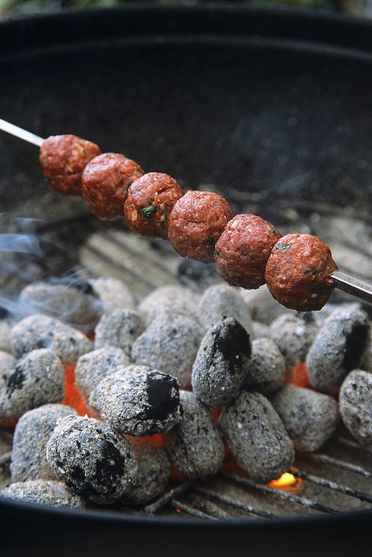 Mince kebab on a barbecue