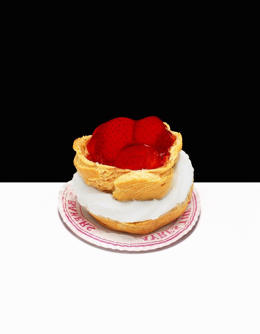 Cream puff filled with strawberries and cream