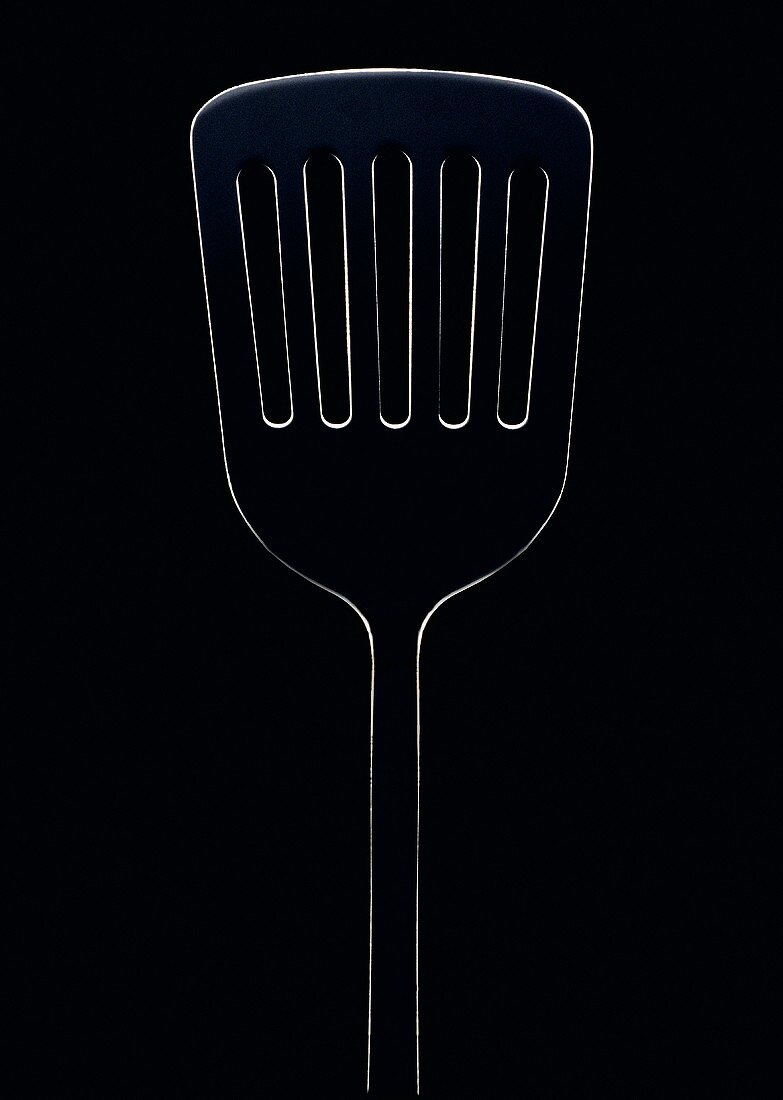 Spatula against a black background