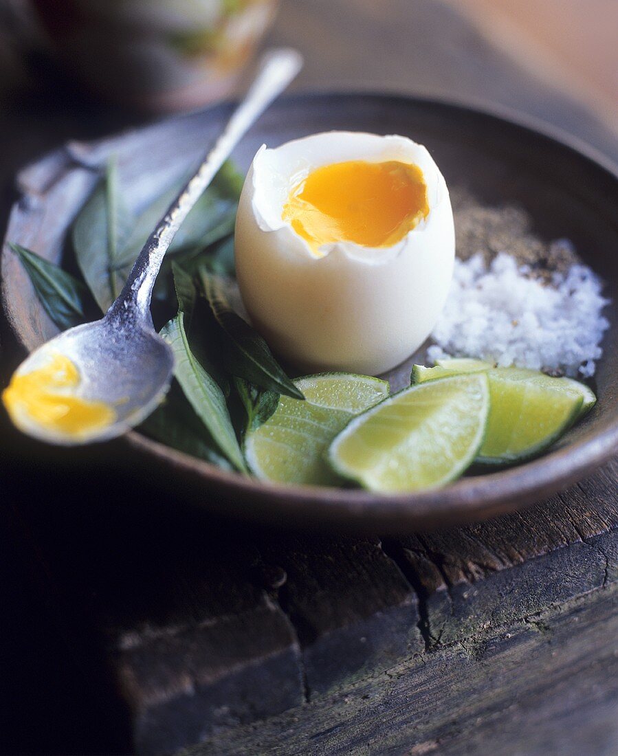 Boiled egg with lime, salt, pepper & Vietnamese coriander