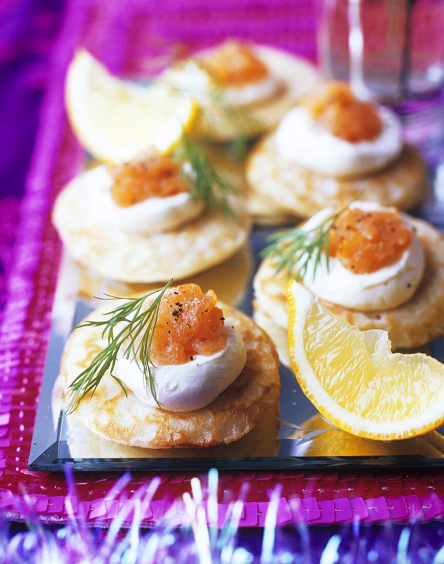 Blinis with crème fraîche and smoked salmon