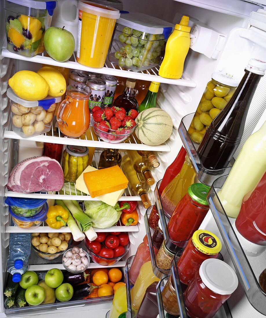 View into a refrigerator full of food