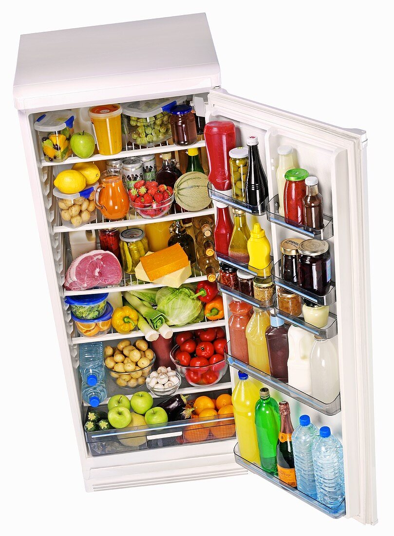 A tall refrigerator full of food
