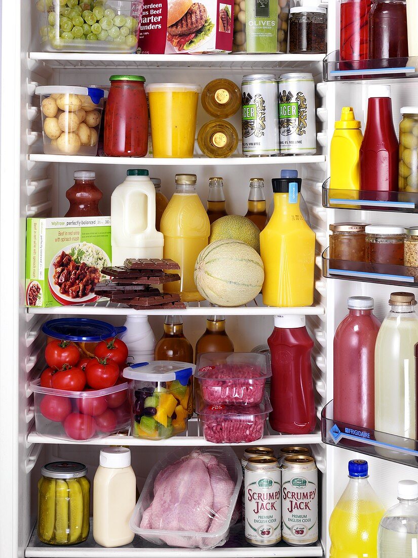 Various foods and drinks in a refrigerator