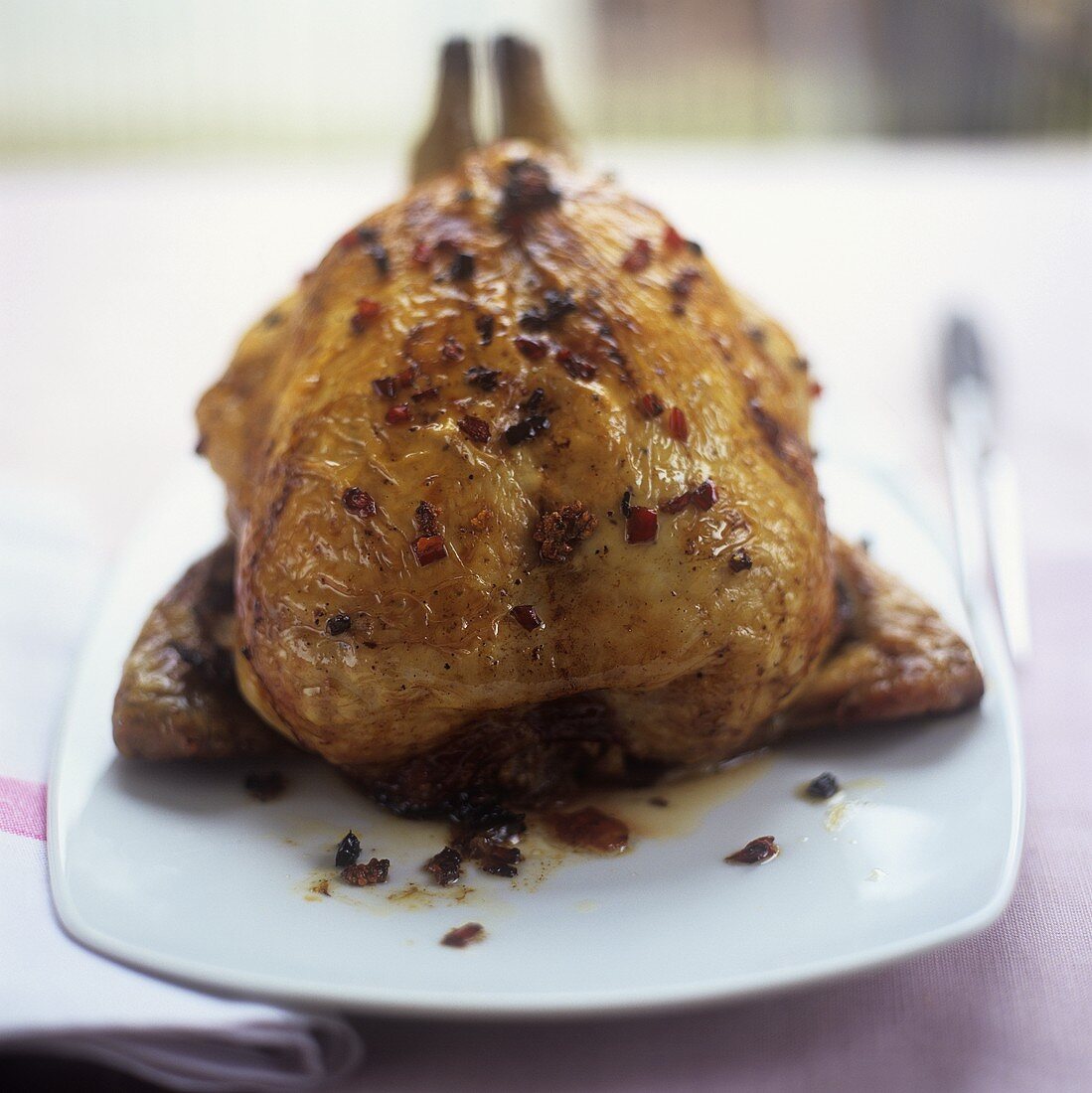 Chilli chicken stuffed with lemon grass on plate