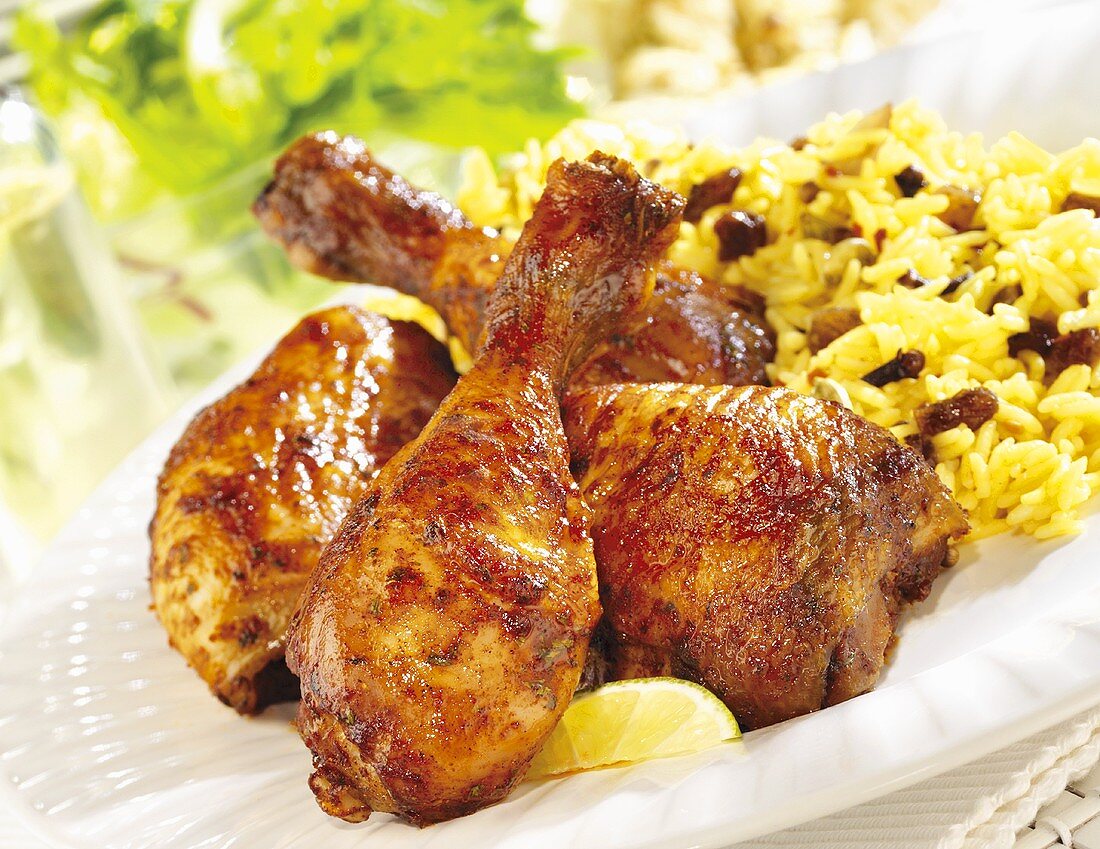 Spicy chicken legs with raisin rice