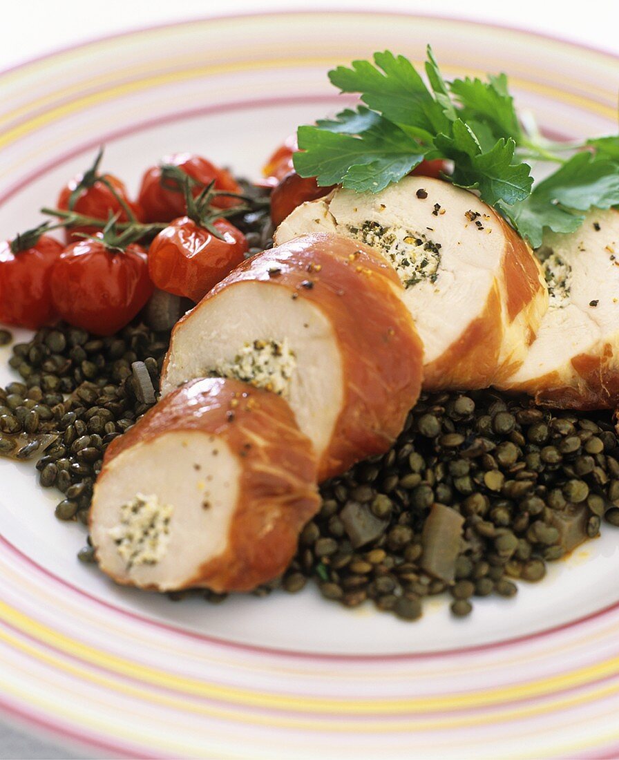 Chicken roulade with herb stuffing, Parma ham and lentils