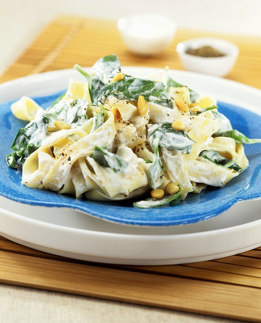 Fettuccine with ricotta, spinach and pine nuts