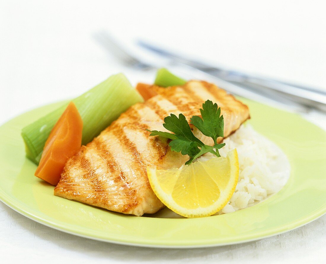 Salmon fillet with vegetables on rice