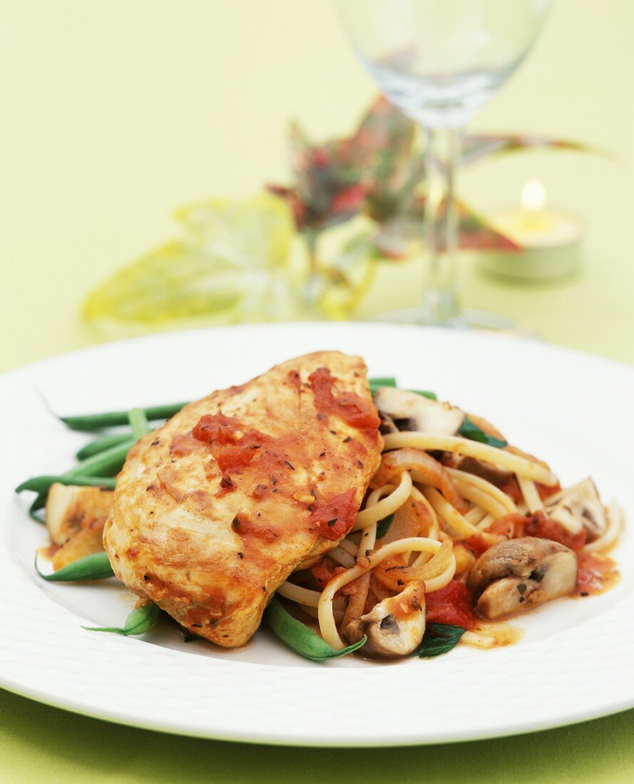 Chicken breast with tomato sauce, beans, mushrooms & linguine