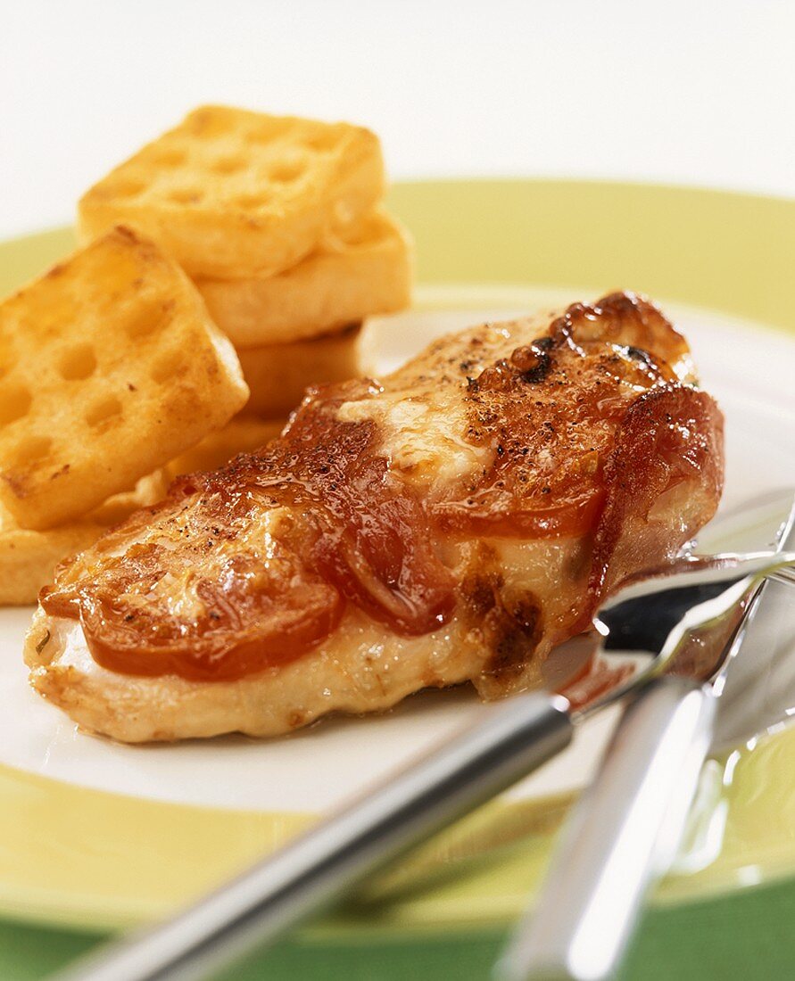 Chicken breast topped with low-fat mozzarella & bacon